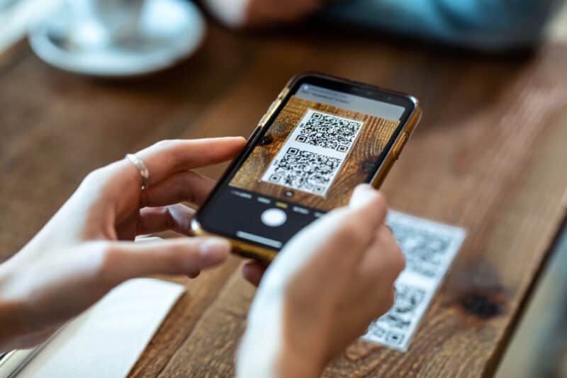 customer scanning QR code at restaurant