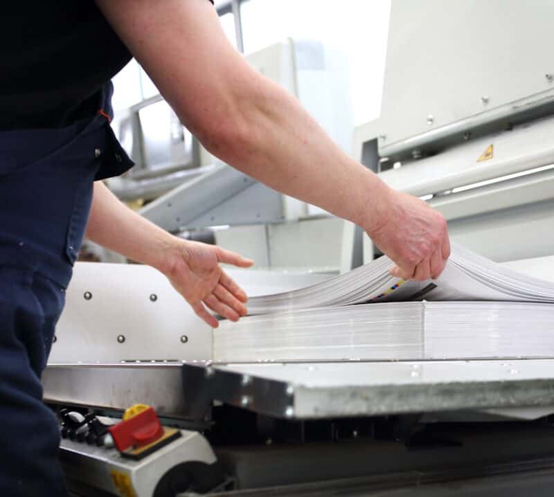 professional printer cutting papers