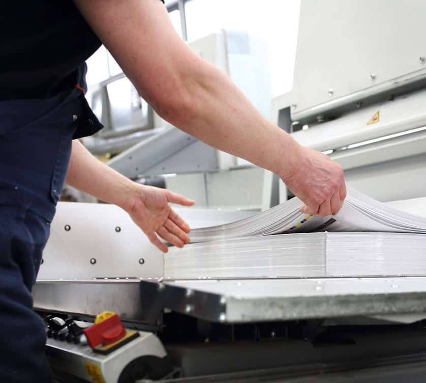 professional printer cutting papers