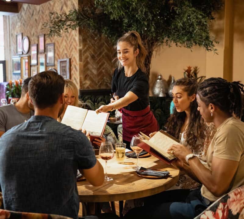 people choosing what to eat at a restaurant