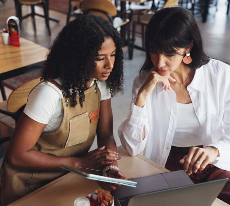 restaurant owners planning menu layout