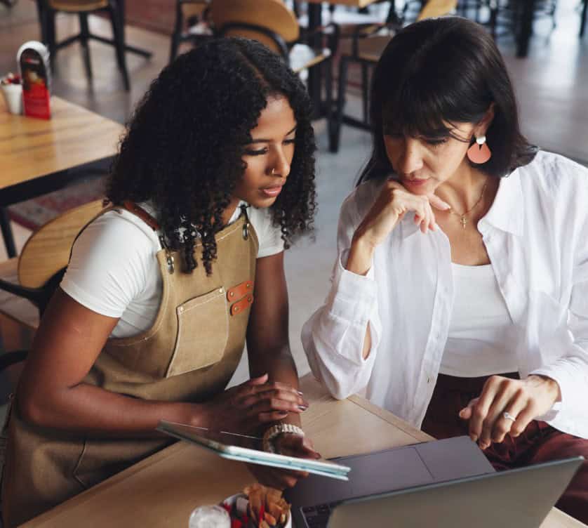 restaurant owners planning menu layout