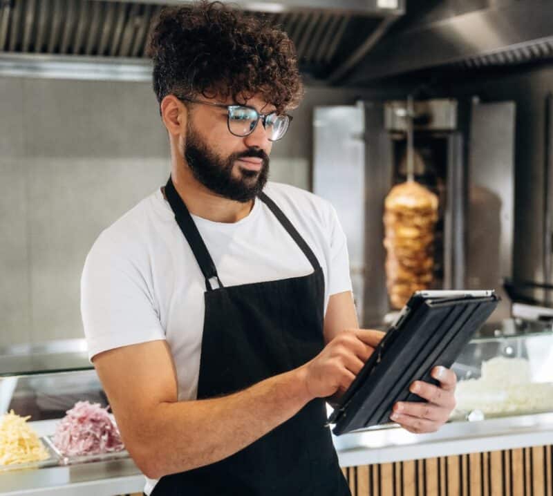 restaurant owner managing menus