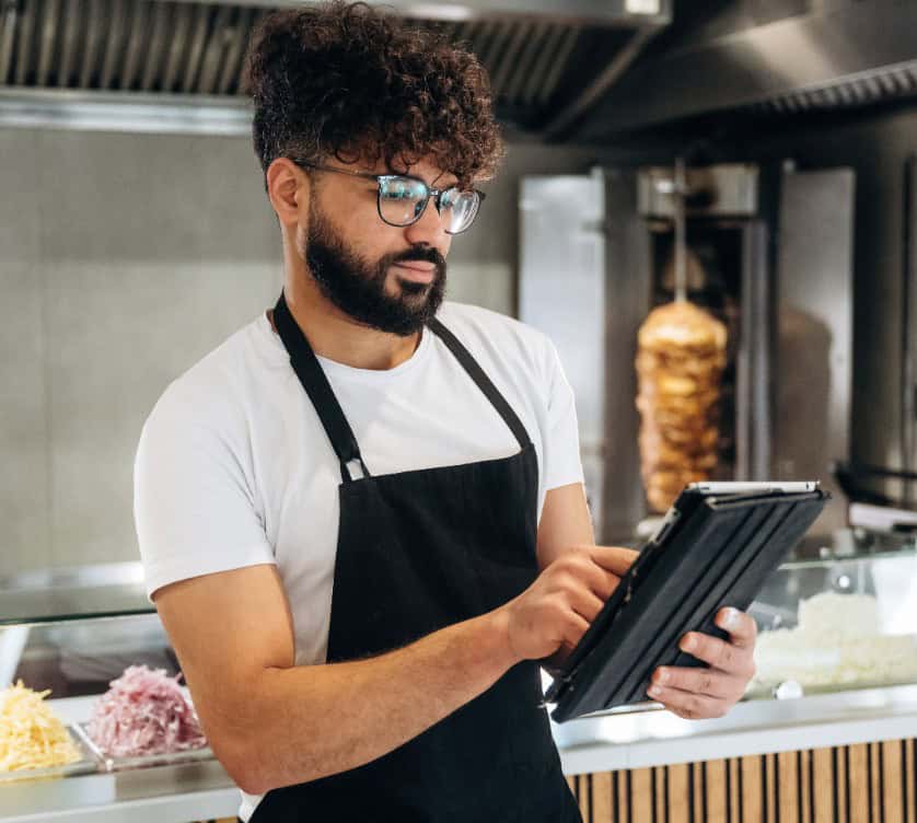 restaurant owner managing menus